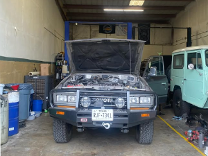 Toyota Land Cruiser with the hood up